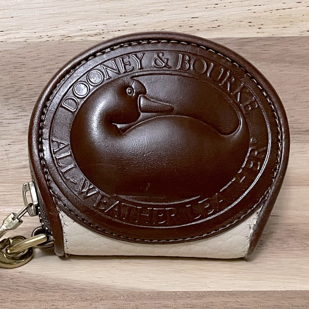 Dooney & Bourke Collectible Vintage leather zip along coin purse with strap BNWT